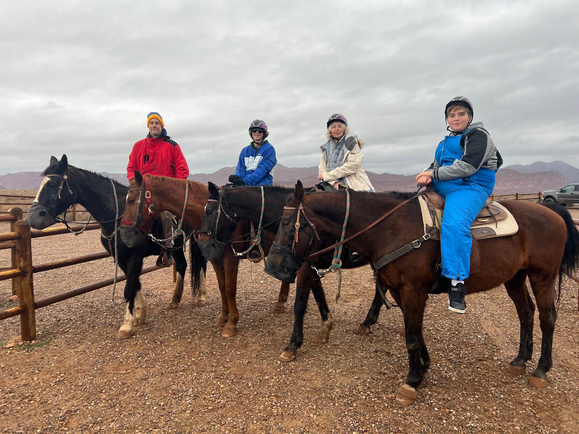 Dr. Coleen Murphy with her family on horseback in the desert.