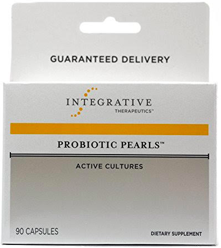 A small, enteric-coated probiotic capsule.